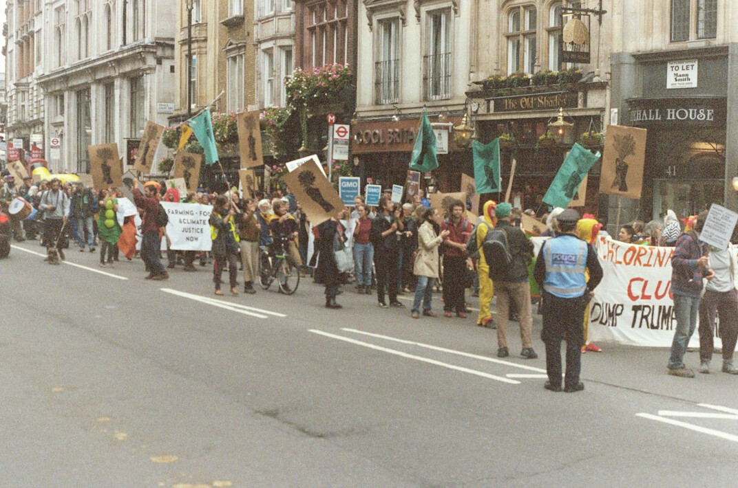 young people marching in street
