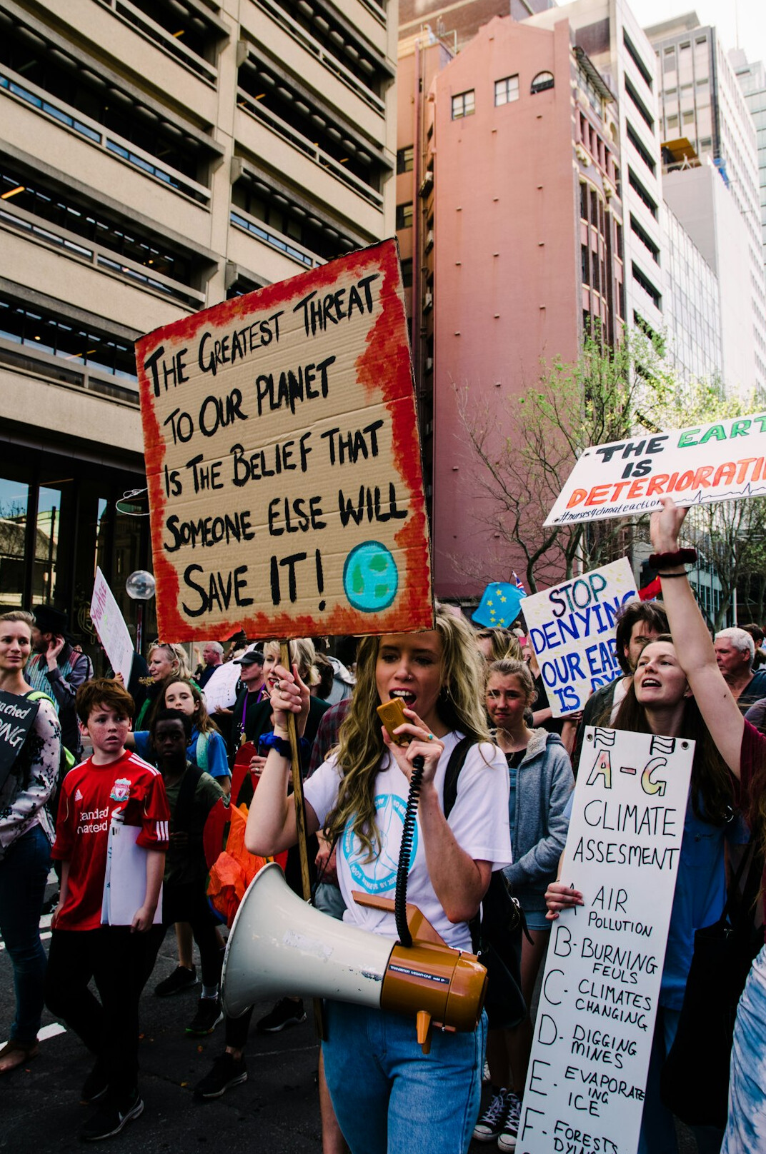 crowd protesting in street