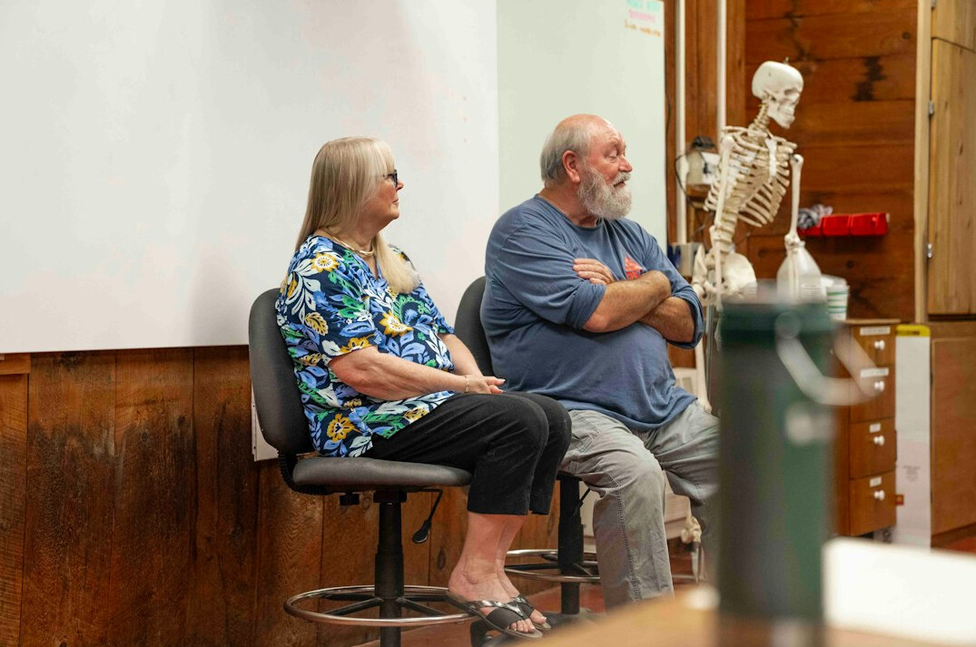 Team of researchers reviewing charts together in a meeting room